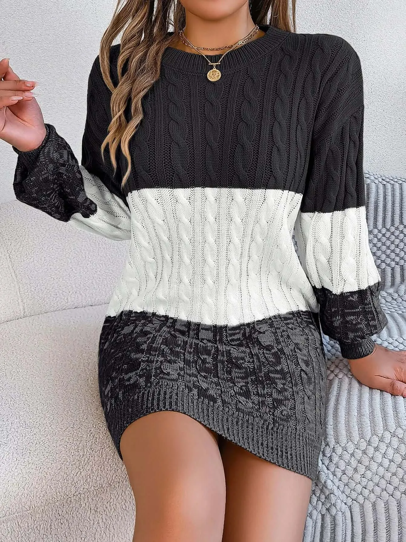 Women's autumn and winter European and American casual color matching twisted lantern sleeve sweater dress